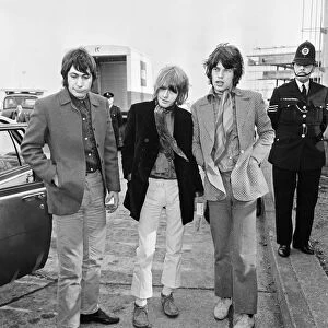 Mick Jagger, Brian Jones and Charlie Watts seen here at London Airport after their