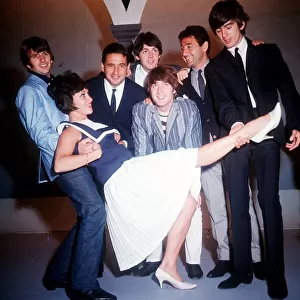 Mike and Bernie Winters and Chita Rivera with the Beatles members Paul McCartney