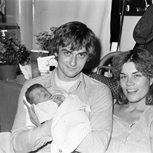 Mike Oldfield, musician and composer, pictured with newborn baby daughter Molly