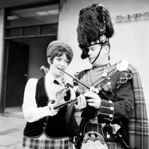 Black and white photograph print of Margaret Savage with a Scots Guardsman Black and white photograph print of Margaret Savage with a Scots Guardsman