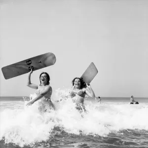 Women body boarding in the surf at Newquay Print Women body boarding in the surf at Newquay Print