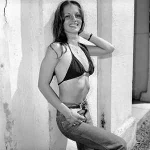 A Glamour Model in Bikini Top and Jeans Print April 1975 A Glamour Model in Bikini Top and Jeans Print April 1975