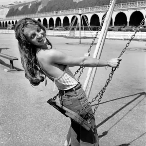 Glamour Model on a Swing, April 1975 Print (00069) Glamour Model on a Swing, April 1975 Print (00069)