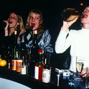 Young Women Drinking from a Bottle Print, January 1996 Young Women Drinking from a Bottle Print, January 1996