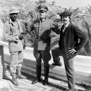 Richard Roundtree, Roger Moore and Sonny Bono on the set of Escape to Athena Richard Roundtree, Roger Moore and Sonny Bono on the set of Escape to Athena