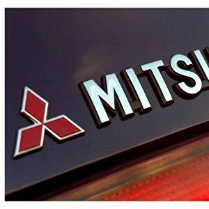 Mitsubishi Carisma car October 1998 tail lights logo