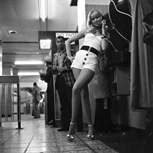 Model Christine Donna seen here using the public telephones at Holborn tube station