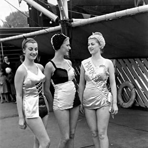 Models displaying Unsinkable bathing costumes. September 1952 C4443