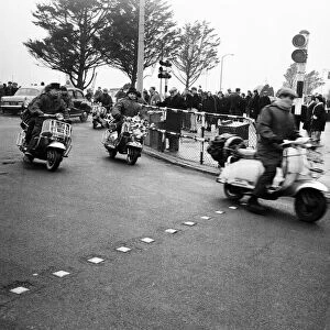 Mods on their scooters seen here driving along Clacton sea front