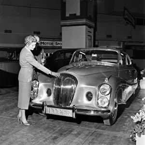 Motor Show: Sir Bernard and Lady Docker photographed beside their new "