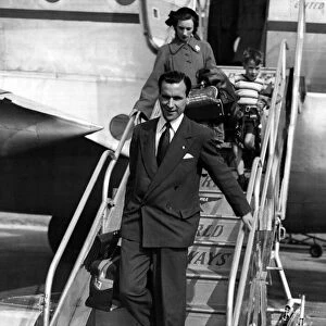 Neil Franklin, Stoke City football player, circa 1947 stepping off a plane
