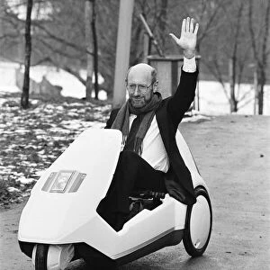 The New Electric Vehicle Sir Clive Sinclair in his new electric vehicle