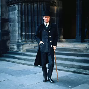 Nicholas Fairbairn politician wearing black coat and bowler hat