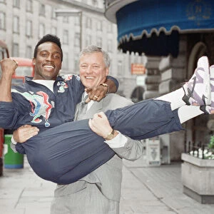 Nigel Benn gets a lift from manager Barry Hearn ahead of his upcoming fight with Kid Milo