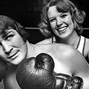 Office worker Jean Lakin, 24, challenges boxer Dave Roden to a three-minute bout after