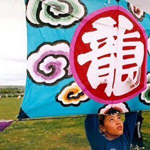 A participant in the annual kite festival at Washington in June 1995