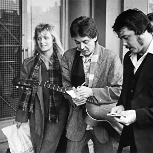 Paul McCartney pictured signing an autograph at The Royal Court Theatre in Liverpool