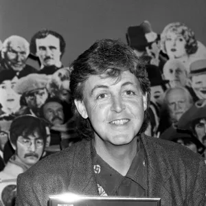 Paul McCartney receiving an award for Sgt. Peppers Lonely Hearts Club Band Album