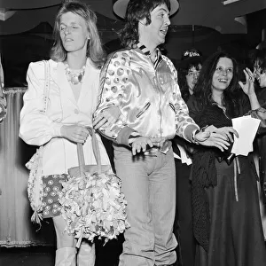 Paul McCartney and his wife Linda McCartney attend the film premiere of Lady Sings The