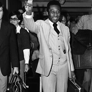 Pele football player for Brazil arriving at Heathrow Airport from Lisbon 1977