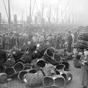 The people of Great Yarmouth greet the Herring Fishing fleet as it lands its catch