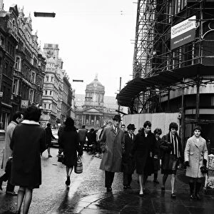 People walking down a street in Liverpool, Merseyside. Circa 1967