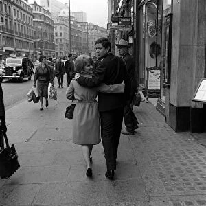 Petula Clark and her husband Claude Wolff go shopping in Regent Street when they were
