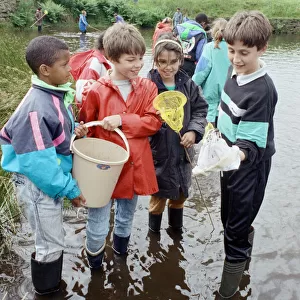 Pond dipping... pupils of Sheepridges Ashbrow Junior School (from left