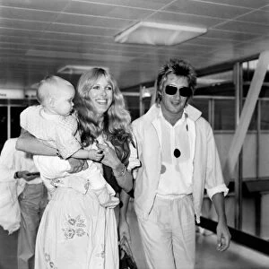 Pop singer Rod Stewart with wife Alana and 10 month old Kimberley leave Heathrow for New