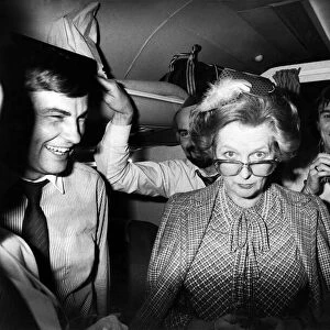 Prime Minister Margaret Thatcher seen here with Journalist on her plane returning to