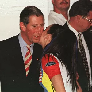 Prince Charles gets a kiss from Spice Girl Mel C in Johannesburg
