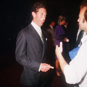 Prince Charles and Princess Diana attend the Genesis concert at Wembley Stadium London