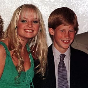 Prince Harry meets Emma Bunton of the Spice girls at his first public engagement in