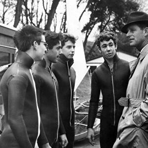 Prince Philip visiting Wales. The Duke of Edinburgh stops to chat with oilskin-suited