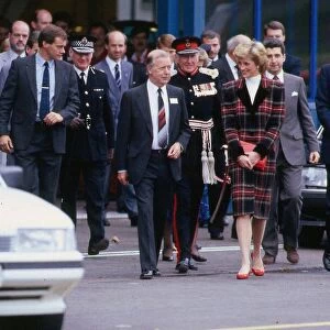 Princess Diana during a visit to Prestwick, Scotland. She is wearing a tartan suit