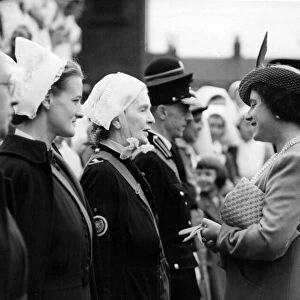 The Queen chatting to Lady Atkinson and Miss P. Watson