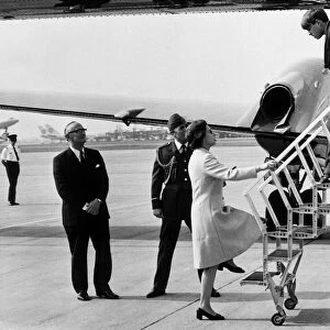 Queen Elizabeth II with Prince Charles at Heathrow Airport before leaving for