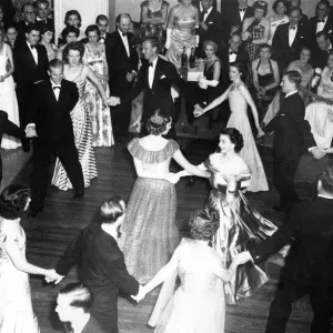 Queen Elizabeth II, Princess Elizabeth dances arms linked with Lady Pamela Mountbatten