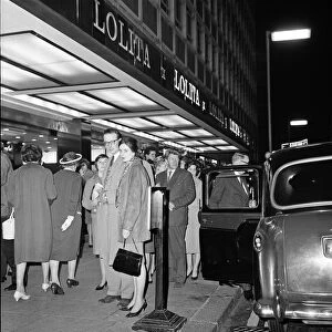 Queues outside the Columbia Cinema on Shaftesbury Avenue to see the film "