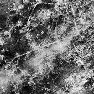 A reconnaissance photograph taken by 542 Squadron RAF of the completely destroyed town of