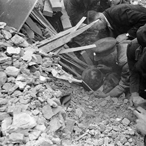 Rescue of Mrs Elsie Smith from remains of her home, 2 Whitta Road, E12