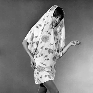 Reveille Fashions 1966: Anne Powell modelling summer dress come shower coat