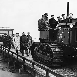 Rhyls new lifeboat tractor seen preparing for submersion tests. 8th January 1954