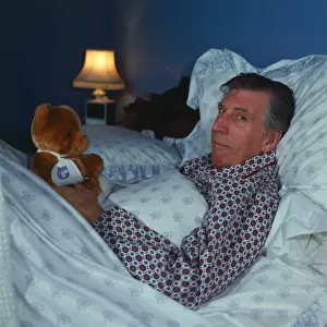 Ricky Fulton in bed with Teddy Bear comedian actor October 1987