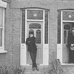 Ringo Starr and John Lennon outside their fictional address in Ailsa Avenue, Twickenham