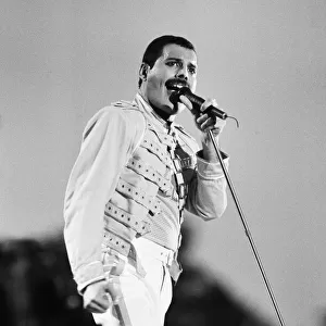 Rock group Queen in concert at Knebworth pop festival. Lead singer Freddie Mercury