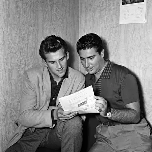 Rock and roll singer Vince Eager alongside his manager Larry Parnes. 20th August 1959