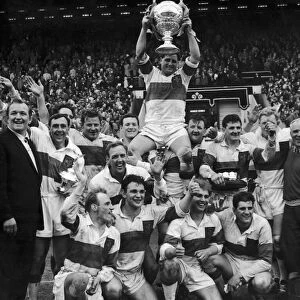 Rocky Turner the Wakefield Trinity captain is chaired with the trophy after his team won