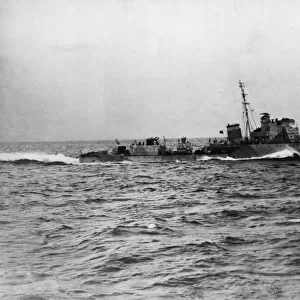Royal Navy Hunt class destroyer HMS Brocklesby at sea during target practice in