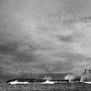 Royal Navy submarine HMS Thunderbolt doing a crash dive at sea during the Second World